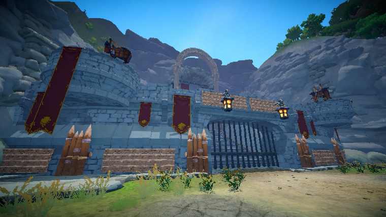 A stone gate and rampart hung with banners, with a mounted ballista above it